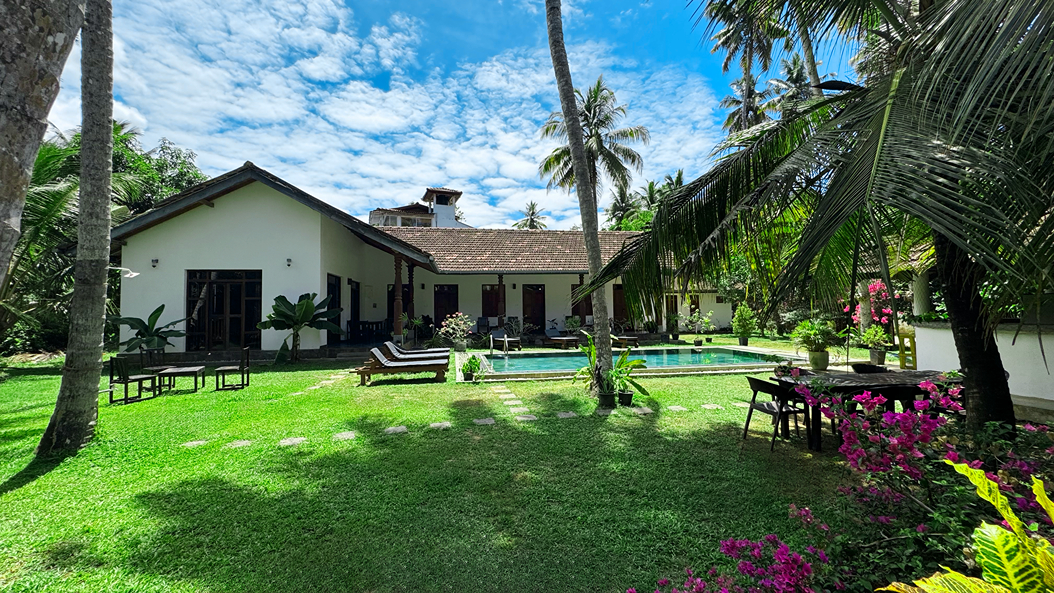 Villa Hiriketiya pool surrounded by tropical foliage, southern Sri Lanka