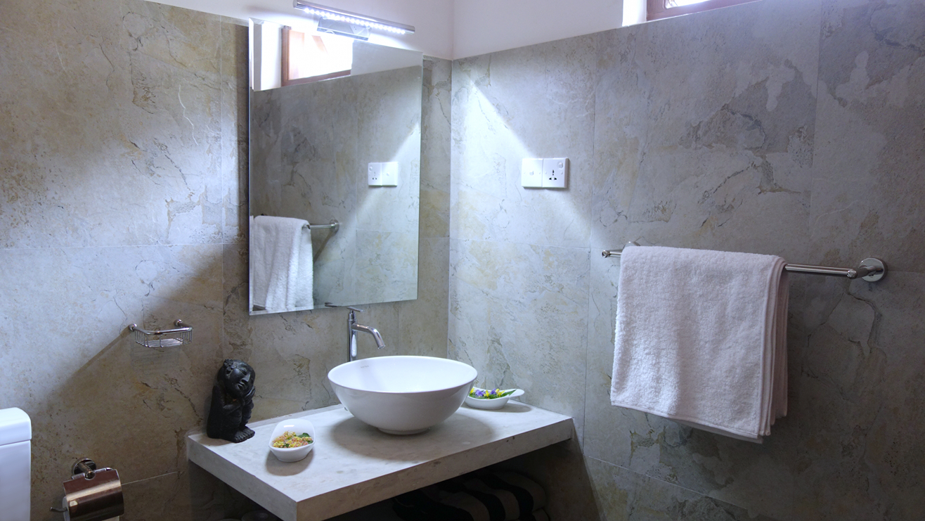 Villa Hiriketiya rooms with traditional wooden doors and tiled floors